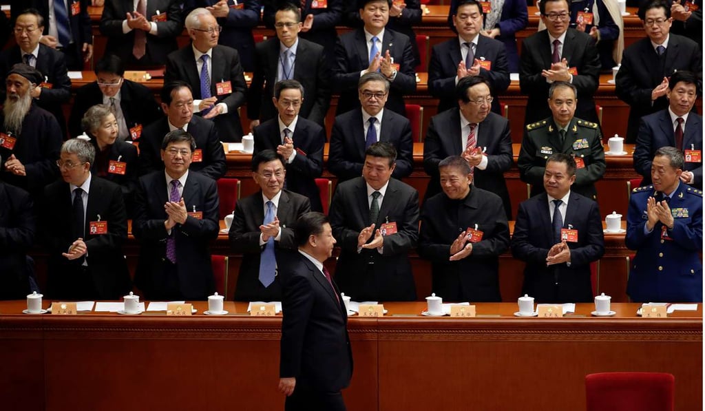 Delegates clap as President Xi Jinping arrives for the opening session of the Chinese People’s Political Consultative Conference last Friday at the Great Hall of the People in Beijing. As Xi enters his fifth year in power, Beijing will say goodbye to Xi Jinping Operating System 1.0, and orchestrate the roll-out of Xi Jinping 2.0. Photo: Reuters