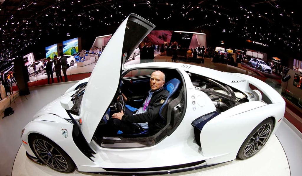 American Ferrari collector Jim Glickenhaus sits in a 800 horsepower SCG 0003S racecar at the 87th International Motor Show. Photo: REUTERS