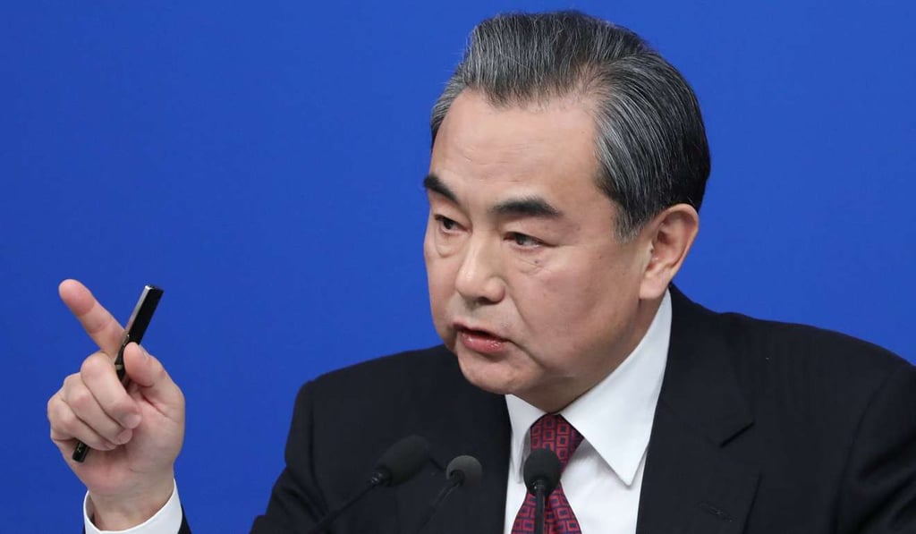 Chinese Foreign Minister Wang Yi answers questions from the media on the sidelines of the National People’s Congress session in Beijing on Wednesday. Photo: EPA