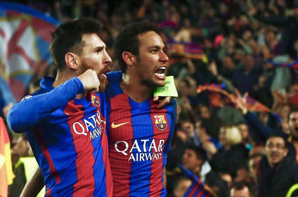 Barcelona’s Lionel Messi and Neymar celebrate winning the Uefa Champions League second leg round of 16 match against Paris Saint-Germain. Photo: EPA