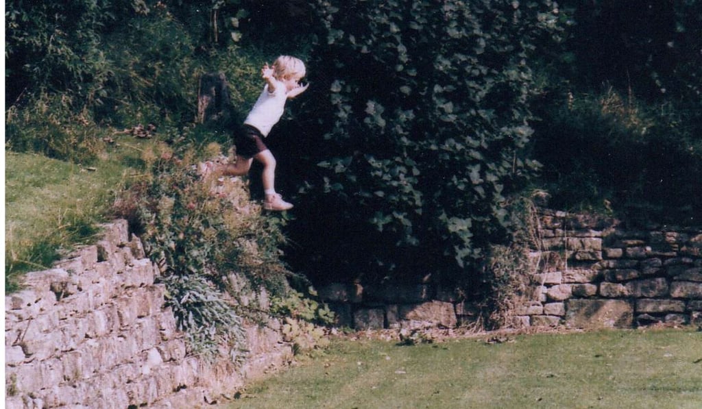 A flying Ben Simpson, aged four.