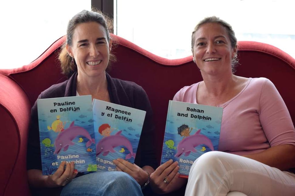 TimTimTom.com founders Gabriela Simmons (left) and Katrien Zondag with some of their personalised books.