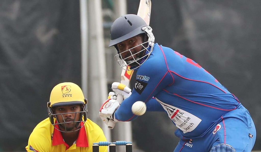 Kowloon Cantons team Dwayne Smith swings into action at the T20 Blitz.