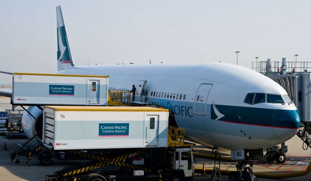 Food services being loaded onto a Cathay Pacific flight. Photo: Alamy Stock Photo Food services being loaded onto a Cathay Pacific flight. Photo: Alamy Stock Photo