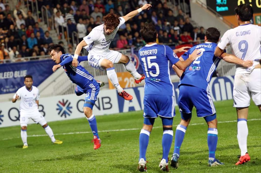 Suwon’s Ko Seung-beom attempts a header against Eastern during their AFC Champions League match at Mong Kok Stadium. Photo: Nora Tam