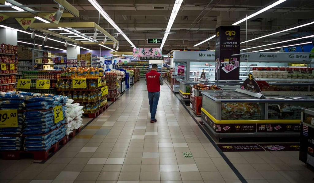 A Lotte Mart employee stands in an almost empty store on Monday in Shanghai. The store remained open but dozens of other Lotte stores in China have been closed, amid a boycott of South Korean products. Photo: AFP A Lotte Mart employee stands in an almost empty store on Monday in Shanghai. The store remained open but dozens of other Lotte stores in China have been closed, amid a boycott of South Korean products. Photo: AFP