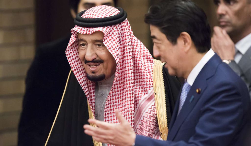 Saudi Arabia's King Salman is escorted by Japanese Prime Minister Shinzo Abe at the prime minister's official residence in Tokyo on Monday. Photo: AP Saudi Arabia's King Salman is escorted by Japanese Prime Minister Shinzo Abe at the prime minister's official residence in Tokyo on Monday. Photo: AP