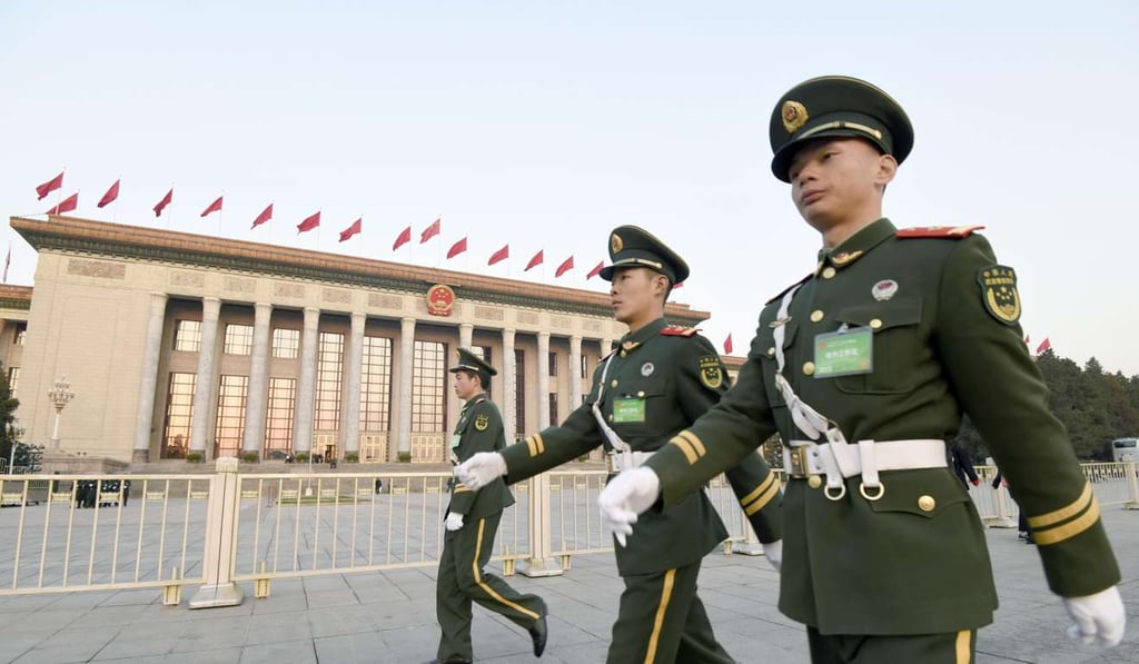 Security officials guard the Great Hall of the People in Beijing, where the National People's Congress ended on Wednesday. Photo: Kyodo Security officials guard the Great Hall of the People in Beijing, where the National People's Congress ended on Wednesday. Photo: Kyodo