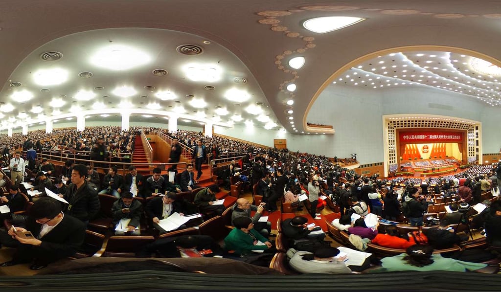 Delegates and members of the media attend the opening of the fifth session of the 12th National People's Congress (NPC) at the Great Hall of the People in Beijing. Photo: Bloomberg