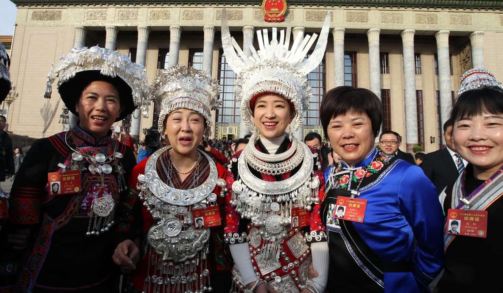 Delegates pose for a picture. Photo: Simon Song