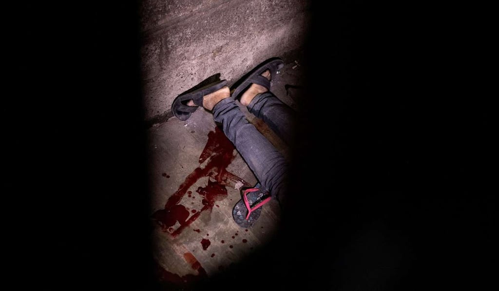 The dead body of a suspected drug dealer at an informal settlers community in Manila. File photo: AFP The dead body of a suspected drug dealer at an informal settlers community in Manila. File photo: AFP