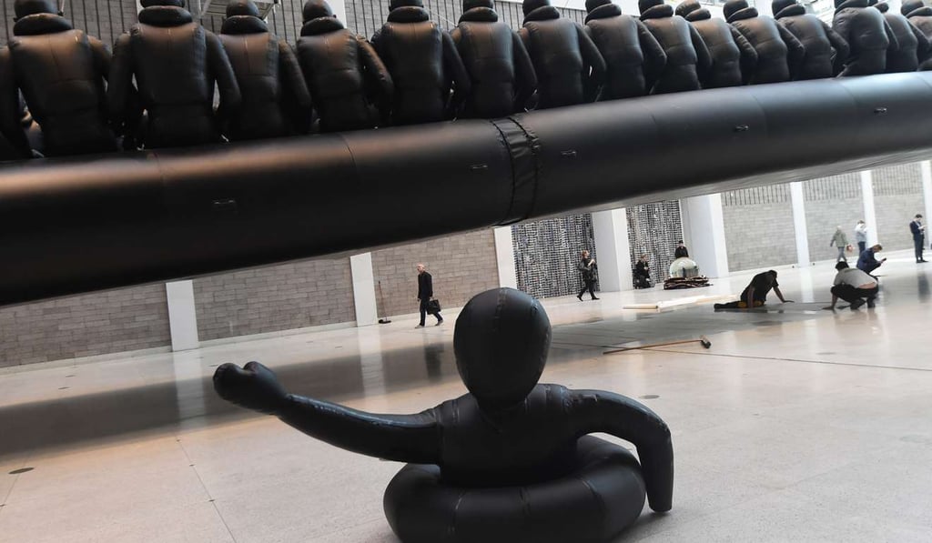 A detail from Ai Weiwei’s Law of the Journey suggests a child lost overboard from a refugee boat. Photo: AFP