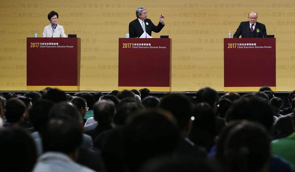 The three contenders take questions from members of the Election Committee. Photo: David Wong The three contenders take questions from members of the Election Committee. Photo: David Wong