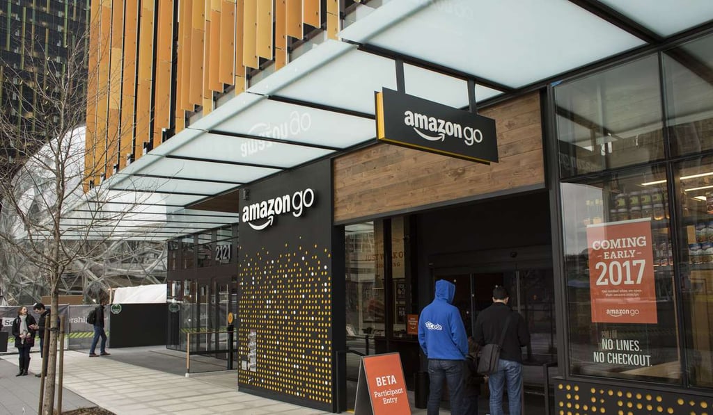 Shoppers enter the new Amazon.com Go grocery store in Seattle, Washington, as the retailer ramps up its battle against counterfeiters. Photo: Bloomberg
