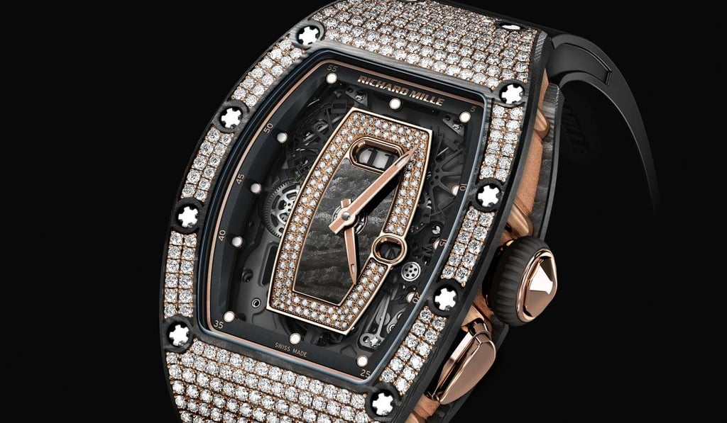 The RM 037 features diamonds set in NTPT carbon on the case.