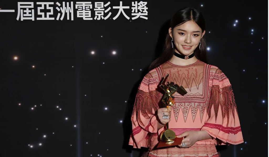 Jelly Lin Yun poses after winning the Rising Star of Asia Award of the Asian Film Awards in Hong Kong. Photo: AP Jelly Lin Yun poses after winning the Rising Star of Asia Award of the Asian Film Awards in Hong Kong. Photo: AP