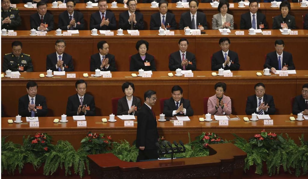 Chief Justice Zhou Qiang on his way to deliver a speech this month during a plenary session of the National People’s Congress, at the Great Hall of the People in Beijing. Photo: AP Chief Justice Zhou Qiang on his way to deliver a speech this month during a plenary session of the National People’s Congress, at the Great Hall of the People in Beijing. Photo: AP