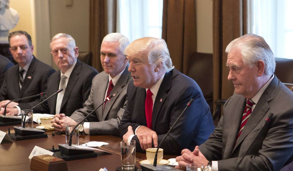US President Donald Trump, flanked by Vice-President Mike Pence (third left) and Secretary of State Rex Tillerson, and other cabinet members, at a meeting with Prime Minister Haider al-Abadi of Iraq (not pictured), in the White House on March 20. Photo: EPA US President Donald Trump, flanked by Vice-President Mike Pence (third left) and Secretary of State Rex Tillerson, and other cabinet members, at a meeting with Prime Minister Haider al-Abadi of Iraq (not pictured), in the White House on March 20. Photo: EPA