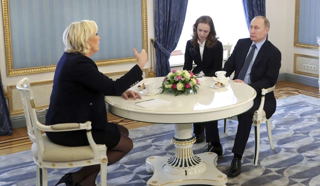 French far-right presidential candidate Marine Le Pen, speaks to Russian President Vladimir Putin. Photo: AP French far-right presidential candidate Marine Le Pen, speaks to Russian President Vladimir Putin. Photo: AP