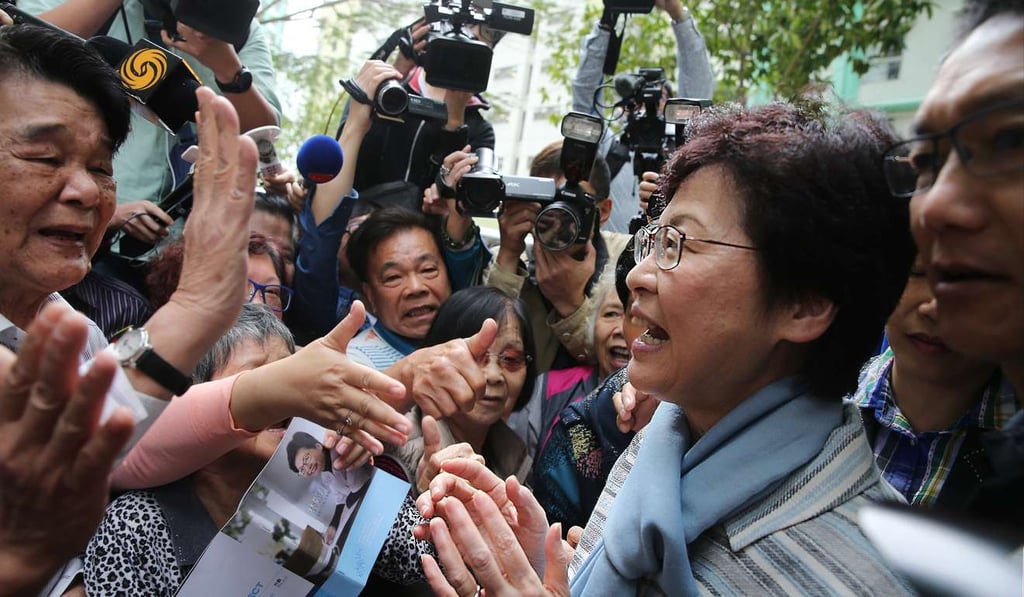 Chief Executive candidate Carrie Lam visits the Tin Chak Shopping Centre in Tin Shui Wai. Photo: Sam Tsang