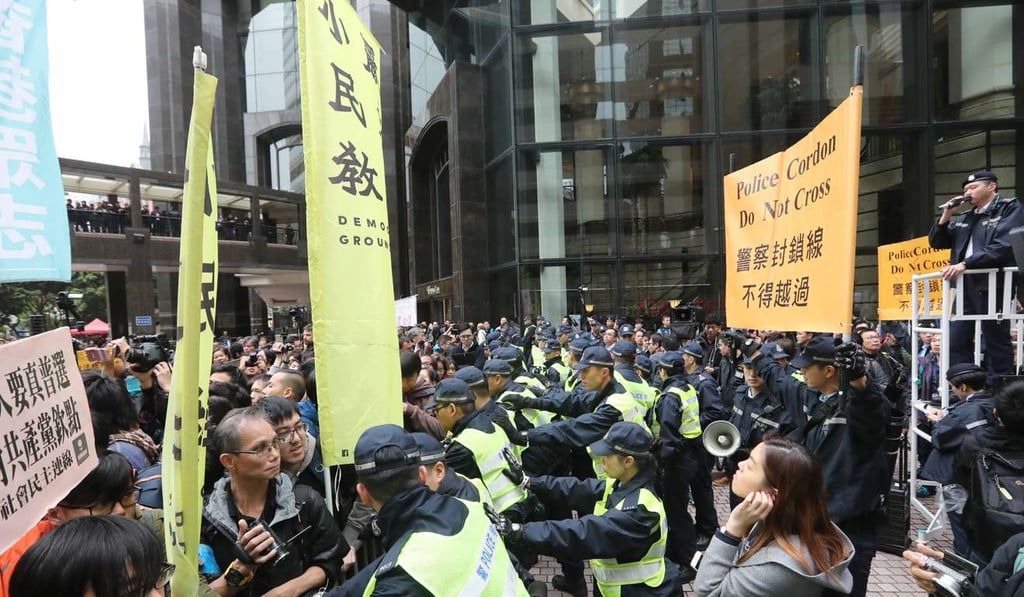 Protesters from the Civil Human Rights Front are stopped by police. Photo: Edward Wong