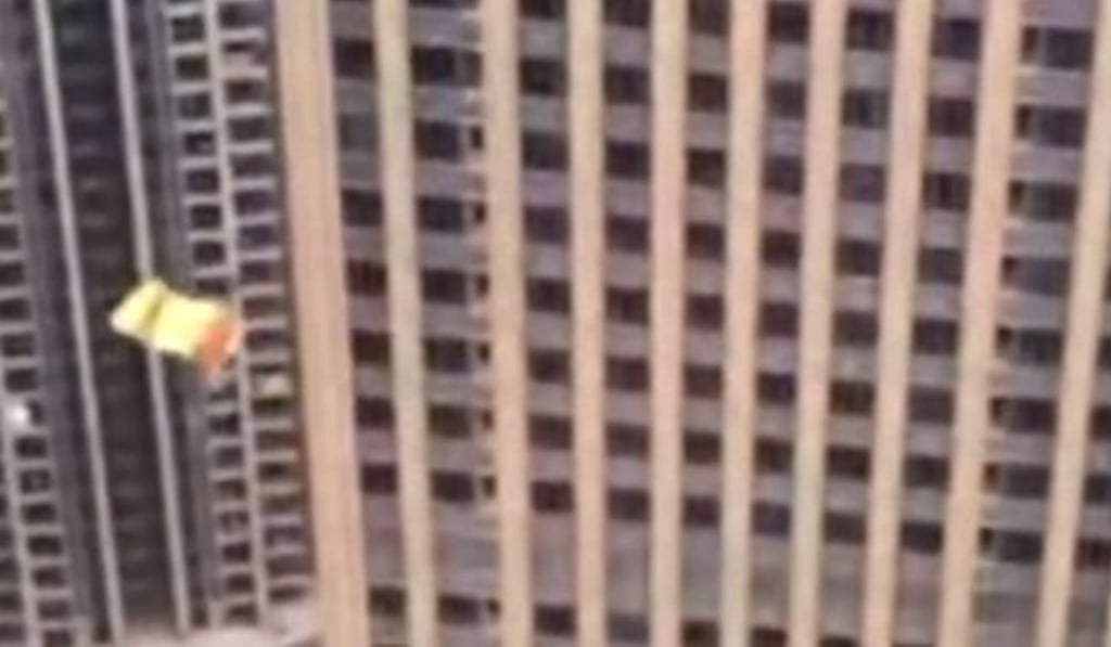 The man seen gliding safely to the ground. Photo: Handout