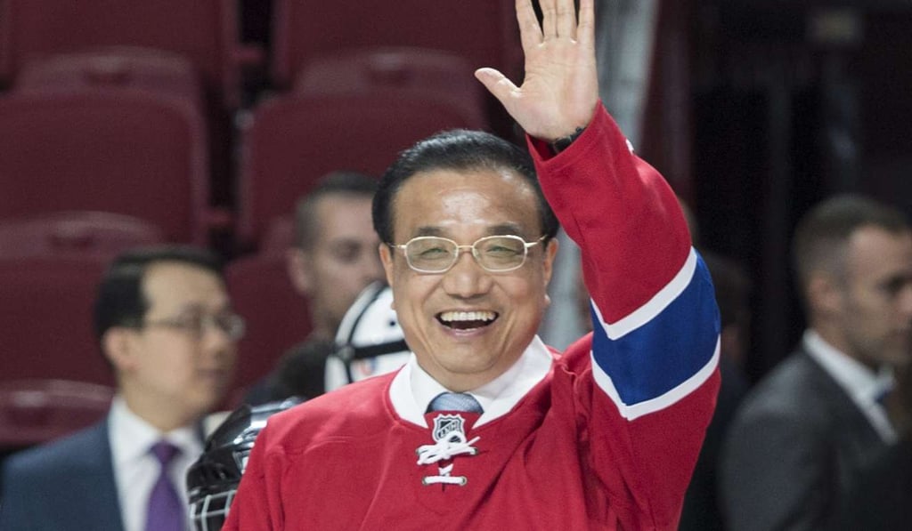 Chinese Premier Li Keqiang, sporting a Montreal Canadiens hockey jersey, waves from centre ice at the Bell Centre in Montreal. The NHL is eyeing opportunities to crack the Chinese market. Photo: The Canadian Press via AP Chinese Premier Li Keqiang, sporting a Montreal Canadiens hockey jersey, waves from centre ice at the Bell Centre in Montreal. The NHL is eyeing opportunities to crack the Chinese market. Photo: The Canadian Press via AP