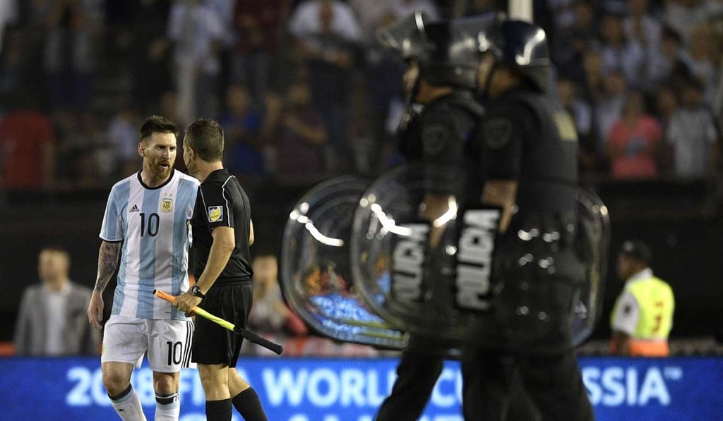 Argentina's forward Lionel Messi (L) argues with first assistant referee Emerson Augusto de Carvalho at the end of their 2018 FIFA World Cup Russia South American qualifier football match against Chile. Photo: AFP Argentina's forward Lionel Messi (L) argues with first assistant referee Emerson Augusto de Carvalho at the end of their 2018 FIFA World Cup Russia South American qualifier football match against Chile. Photo: AFP