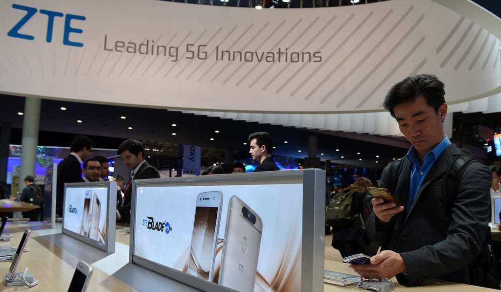 A visitor testing ZTE Blade v8 phone on the first day of the Mobile World Congress in Barcelona. The US government has slapped US$1.2 billion in fines on Chinese telecom giant ZTE for violations of US export controls for selling goods to Iran and North Korea. Photo: AFP A visitor testing ZTE Blade v8 phone on the first day of the Mobile World Congress in Barcelona. The US government has slapped US$1.2 billion in fines on Chinese telecom giant ZTE for violations of US export controls for selling goods to Iran and North Korea. Photo: AFP