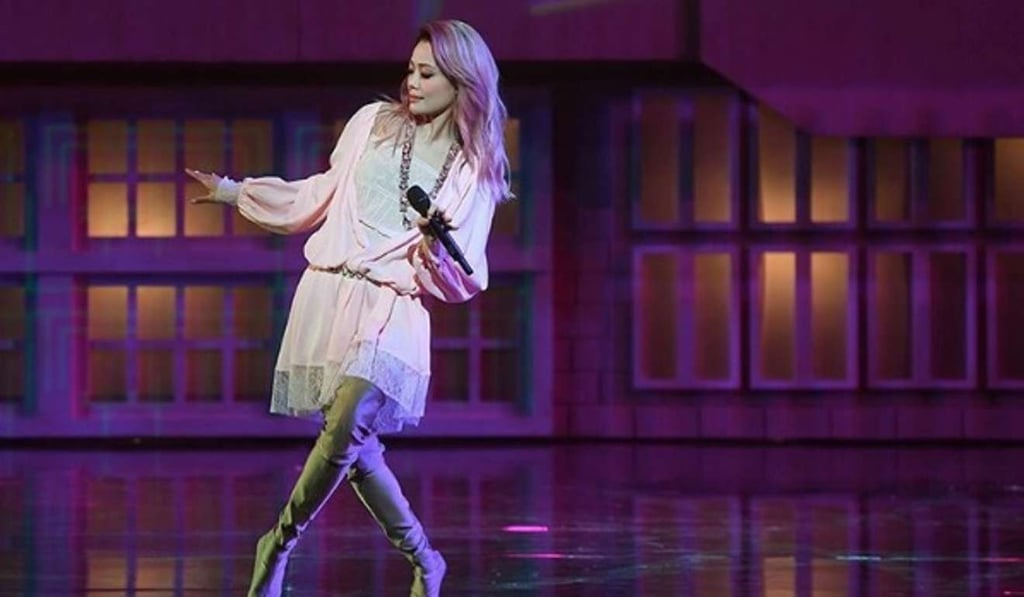 Joey Yung wearing Chanel and Balenciaga for her My Secret Live Concert.