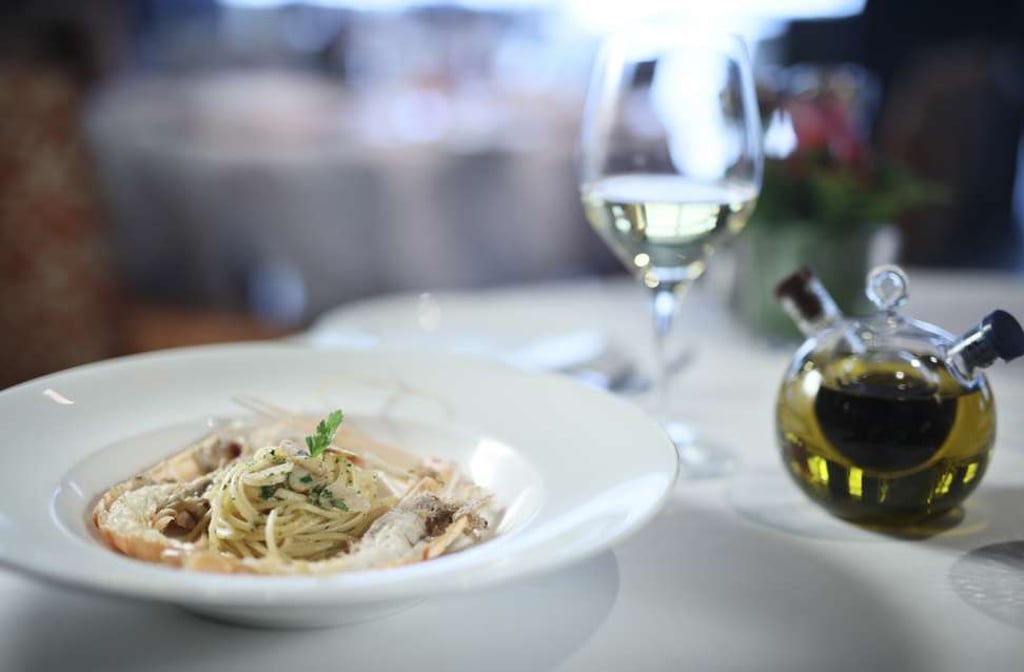 Cucina’s linguine with garlic, olive oil, chilli and seared scampi.