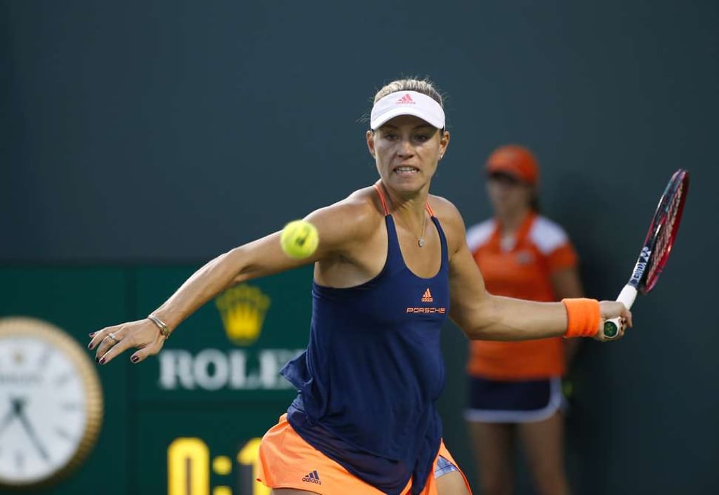 Kerber returns a shot against Williams. Photo: TNS
