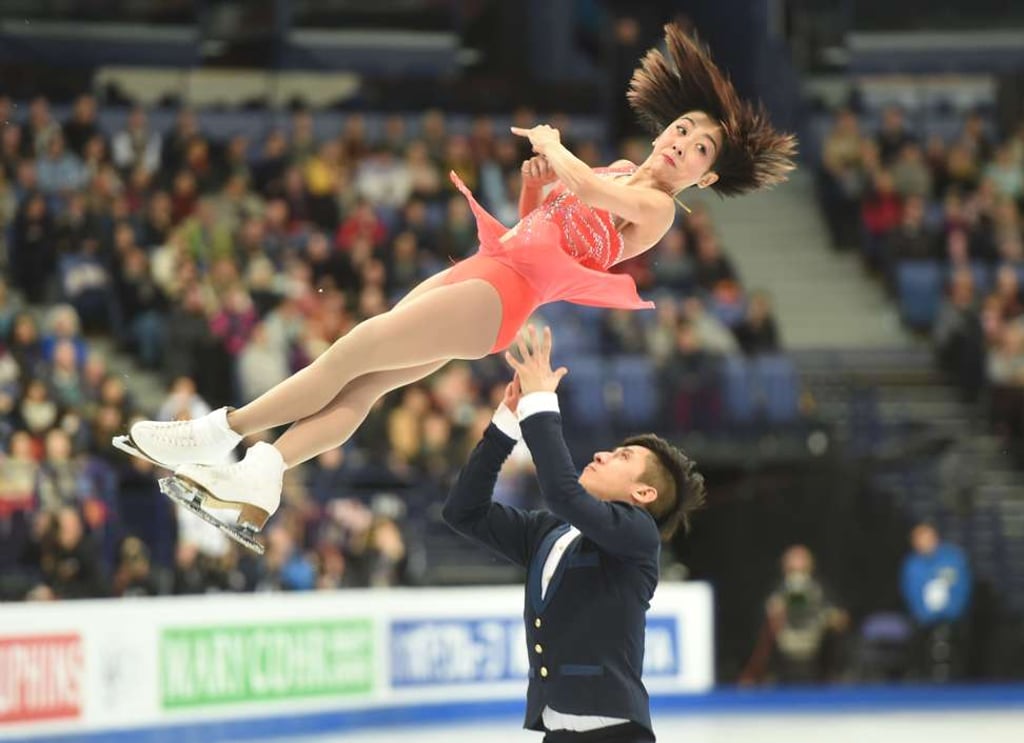 Gold medallists Sui and Han compete at the World Figure Skating Championships in Helsinki. Photo: AFP