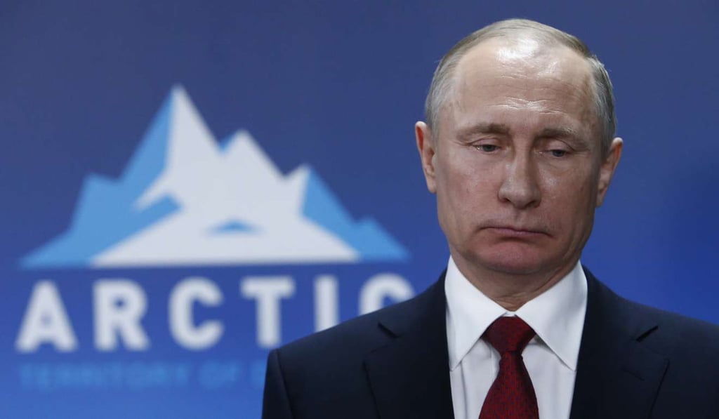 Russian President Vladimir Putin looks on after a meeting with President of Iceland Gudni Johannesson at the International Arctic Forum in Arkhangelsk, Russia. Photo: Pool photo via AP Russian President Vladimir Putin looks on after a meeting with President of Iceland Gudni Johannesson at the International Arctic Forum in Arkhangelsk, Russia. Photo: Pool photo via AP