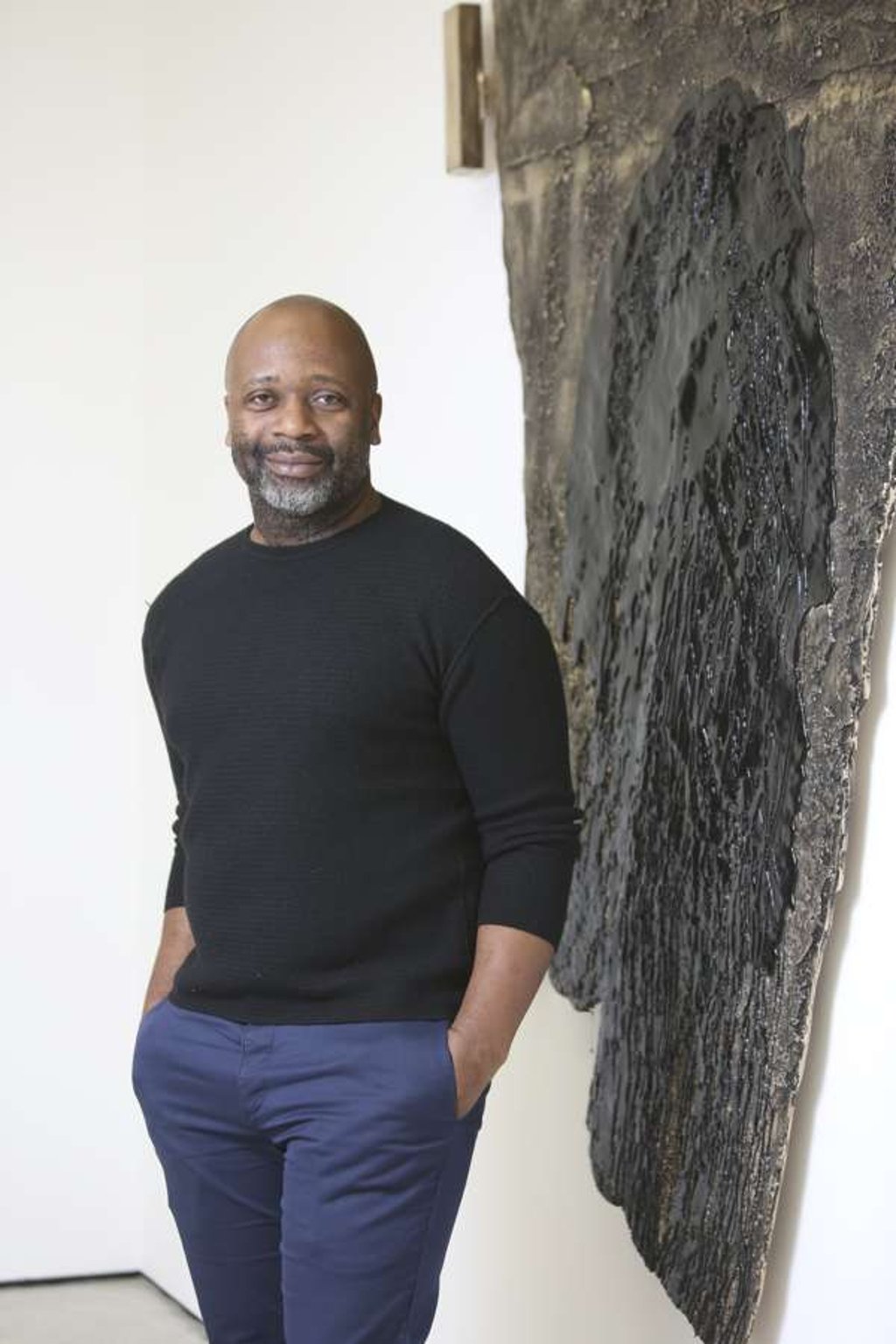 Gates with one of his creations, Africa Gold (2017). Picture: Xiaomei Chen