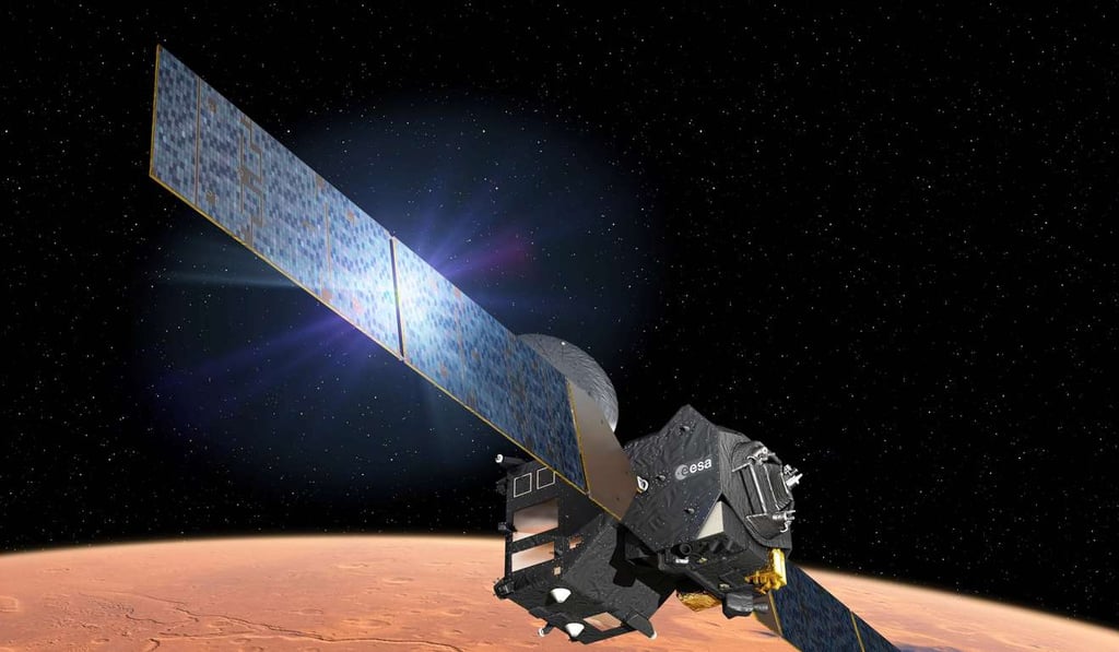 This handout photo taken from the European Space Agency website on March 1, 2016 shows an artist’s impression depicting the separation of the ExoMars 2016 entry, descent and landing demonstrator module, named Schiaparelli, from the Trace Gas Orbiter, and heading for Mars. Photo: AFP