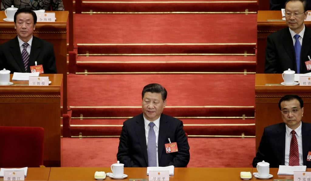 China's President Xi Jinping (1st row, L) and Premier Li Keqiang (1st row, R) attend the second plenary session of the National People's Congress (NPC) at the Great Hall of the People in Beijing. Xi and Donald Trump are to hold their first summit next week. Photo: Reuters
