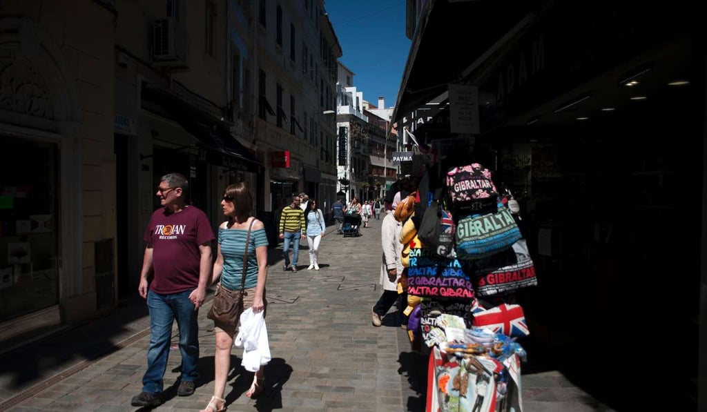 A couple walk along a street in Gibraltar, the British overseas territory on Spain's southern tip. Spain has acquired virtual veto power over the future of the territory with Britain poised to leave the EU. Photo: AFP