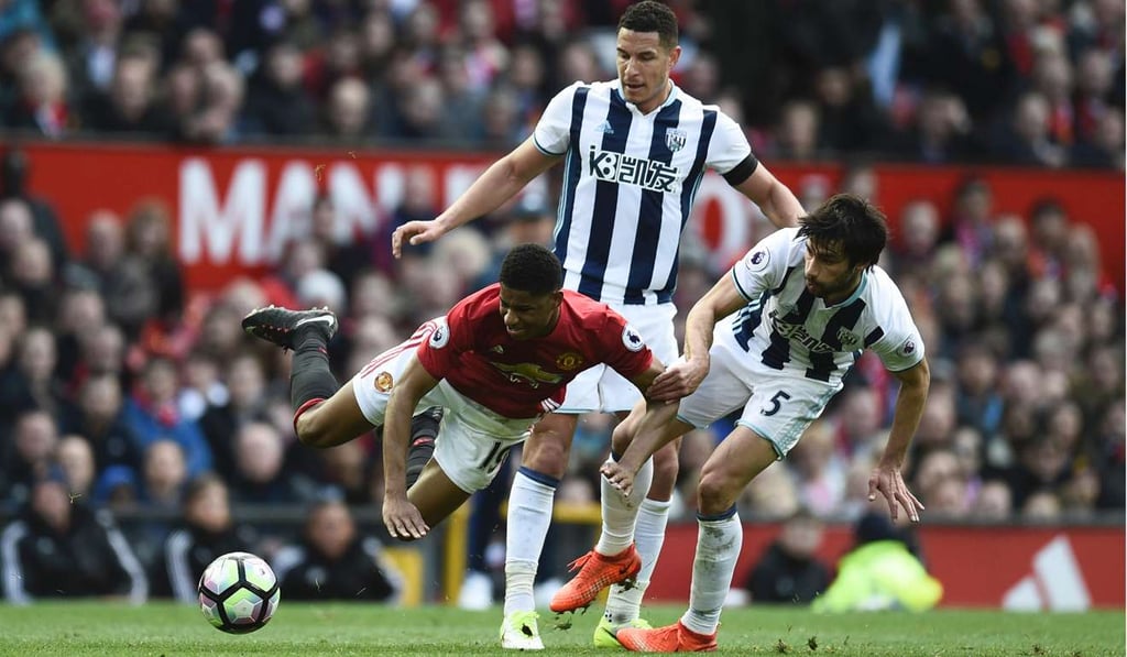 West Bromwich Albion midfielder Claudio Yacob (right) with Manchester United striker Marcus Rashford. Photo: AFP West Bromwich Albion midfielder Claudio Yacob (right) with Manchester United striker Marcus Rashford. Photo: AFP