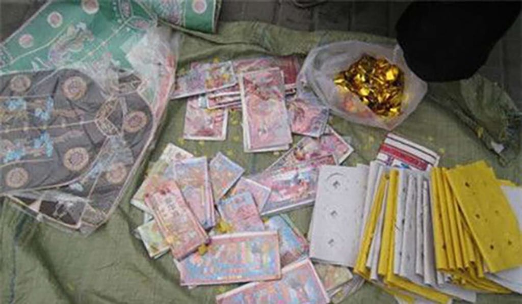 Poor quality paint used on joss paper can contain heavy metals. Photo: Handout Poor quality paint used on joss paper can contain heavy metals. Photo: Handout