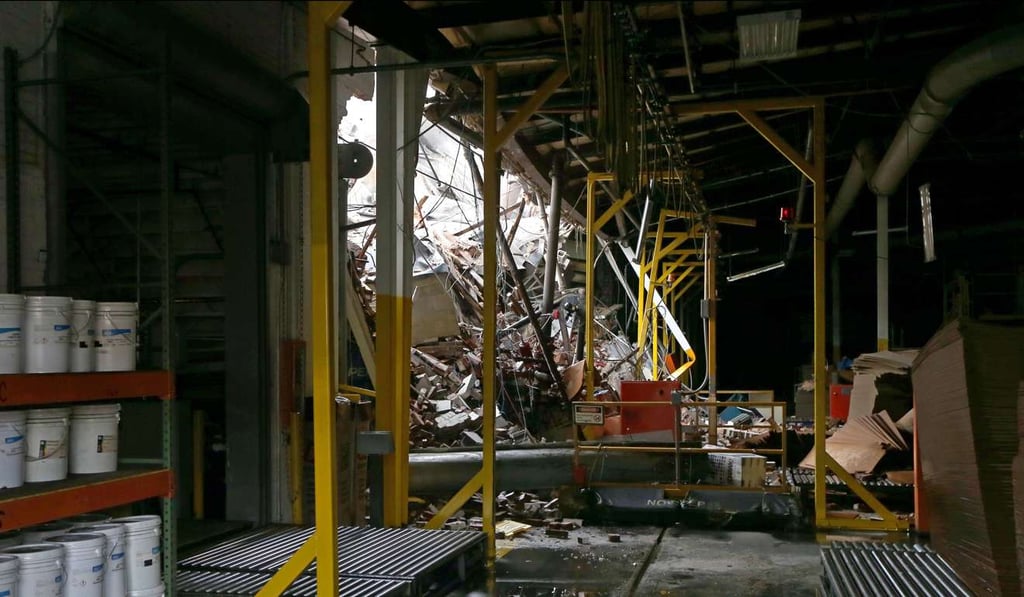 The interior of the Loy-Lange Box Company in St. Louis, after an explosion killed one person and launched a boiler about 150 metres. Photo: TNS The interior of the Loy-Lange Box Company in St. Louis, after an explosion killed one person and launched a boiler about 150 metres. Photo: TNS