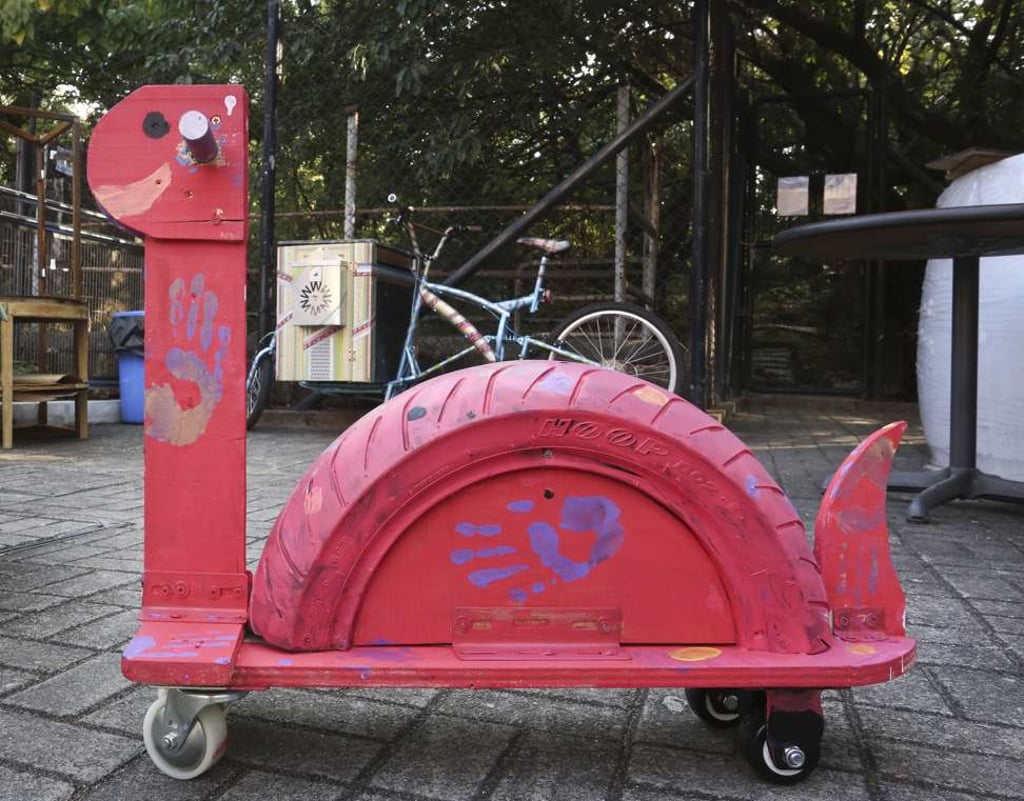 A child’s toy and (at the rear) a food bike.