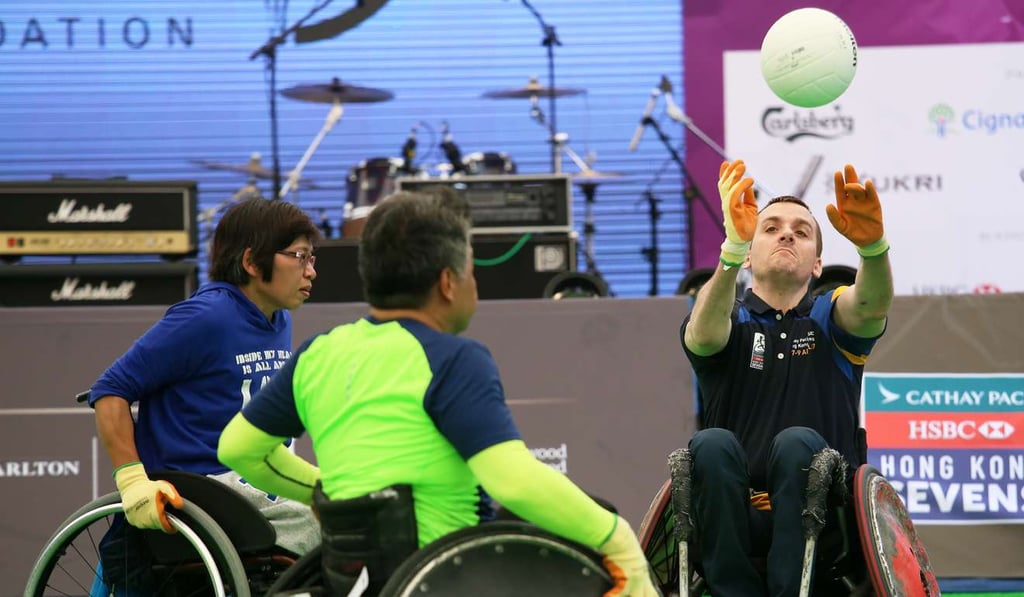 Andy Barrow with some participants during a rugby demonstration.