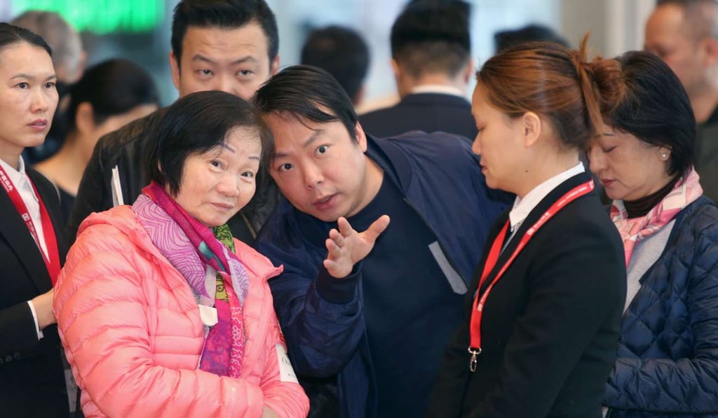 Potential buyers visit the sales office of the One Kai Tak development in January. The developer won the project in 2013 under the “Hong Kong Property for Hong Kong People” initiative. Photo: Xiaomei Chen