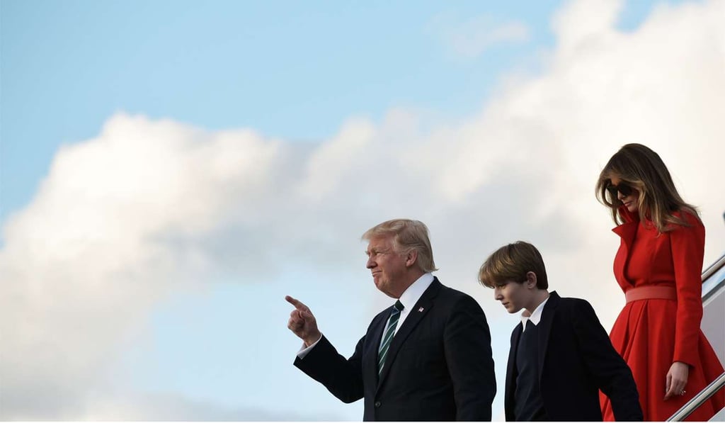 US President Donald Trump, with son Barron and wife Melania, step off Air Force One on a recent trip to Mar-a-Lago estate in Florida, the site of an upcoming summit between President Trump and Chinese President Xi Jinping. Photo: AFP