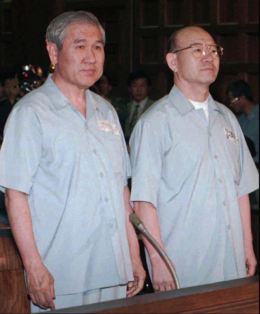 Former South Korean presidents Roh Tae-woo (left) and Chun Doo-hwan appear in court during their trial in Seoul in August 1996. The charges dated back to the uprising in 1980 in which soldiers fired into mobs in Gwangju. Convicted of treason, Chun was sentenced to death; Roh, guilty of corruption, got 22 years. Both were later pardoned. Photo: Yonhap via AP Former South Korean presidents Roh Tae-woo (left) and Chun Doo-hwan appear in court during their trial in Seoul in August 1996. The charges dated back to the uprising in 1980 in which soldiers fired into mobs in Gwangju. Convicted of treason, Chun was sentenced to death; Roh, guilty of corruption, got 22 years. Both were later pardoned. Photo: Yonhap via AP
