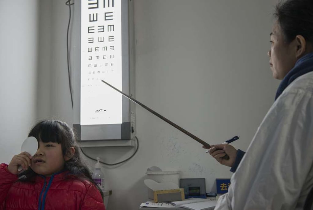 A child takes an eye test at the Shanghai Eye Disease Prevention and Treatment Centre.