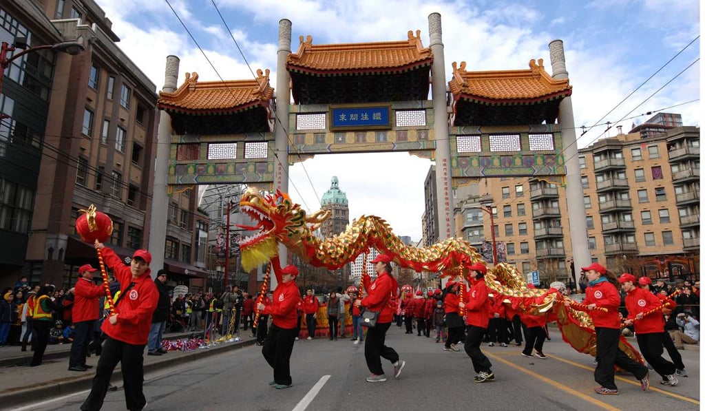 Dragon dancers take part in a Lunar New Year Parade in Chinatown in Vancouver, Canada. Photo: Xinhua