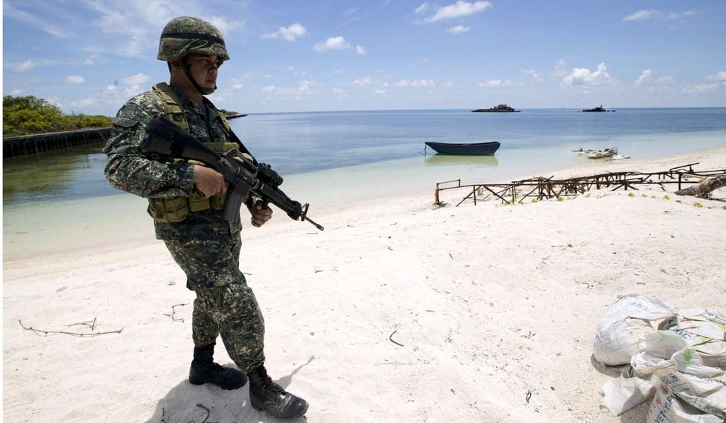 A Filipino soldier on the shore of Pagasa island. Photo: Reuters