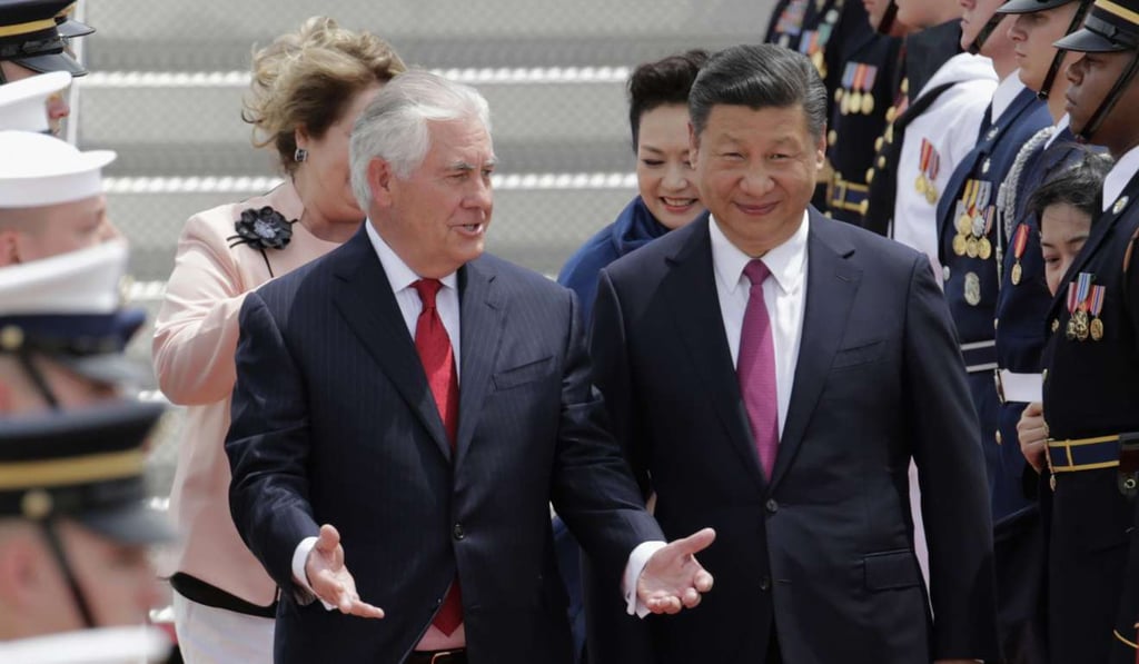 In this April 6 photo, US Secretary of State Rex Tillerson, left, walks with Chinese president Xi Jinping at the Palm Beach International Airport . Photo: AP In this April 6 photo, US Secretary of State Rex Tillerson, left, walks with Chinese president Xi Jinping at the Palm Beach International Airport . Photo: AP